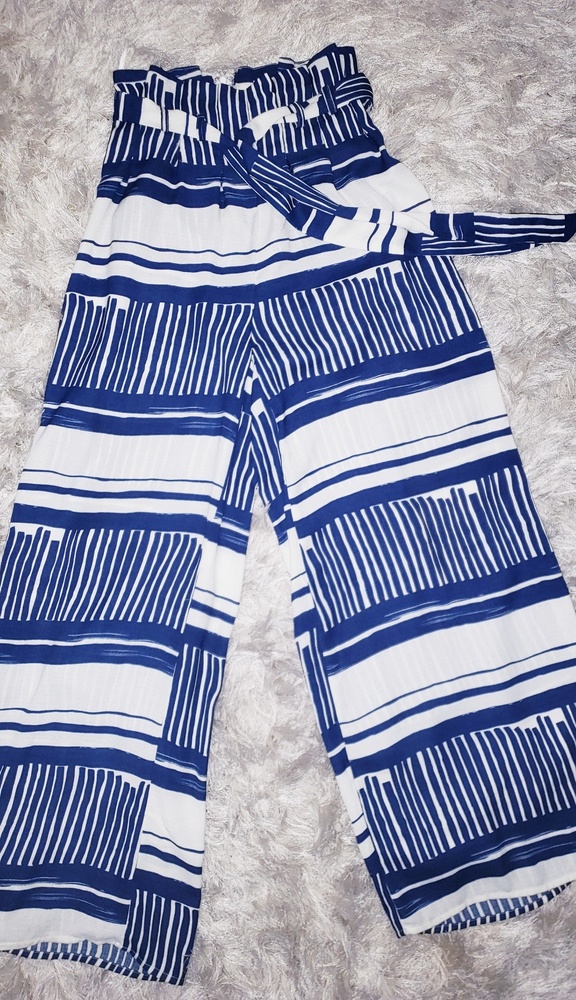 Woman's long blue & white polyester flared pants